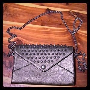 Silver studded clutch